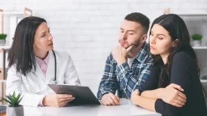 An Indian couple works together as a team to understand male infertility solutions and treatment options.